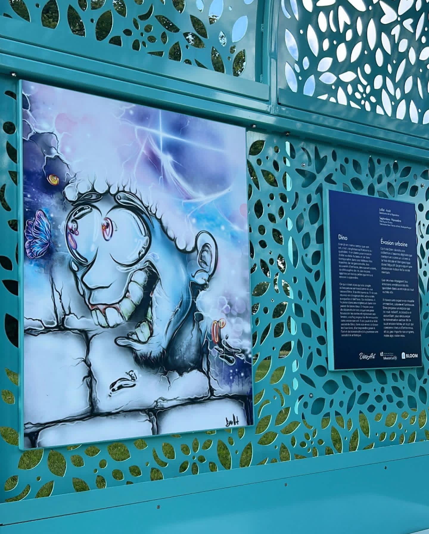 The completed mural within its urban environment
