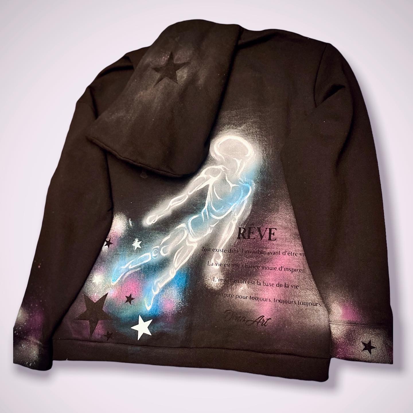 RÊVE hoodie, poem and blue figure