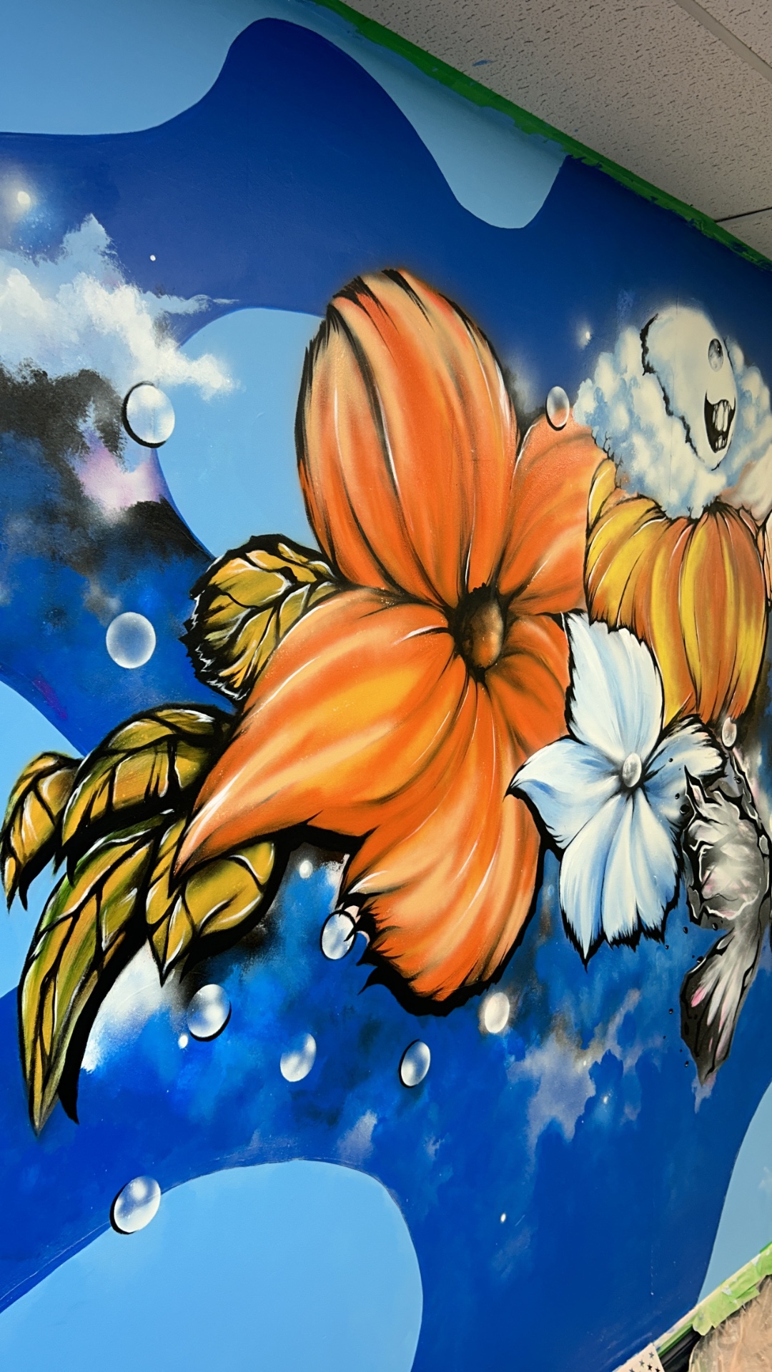 Mural · flowers and clouds